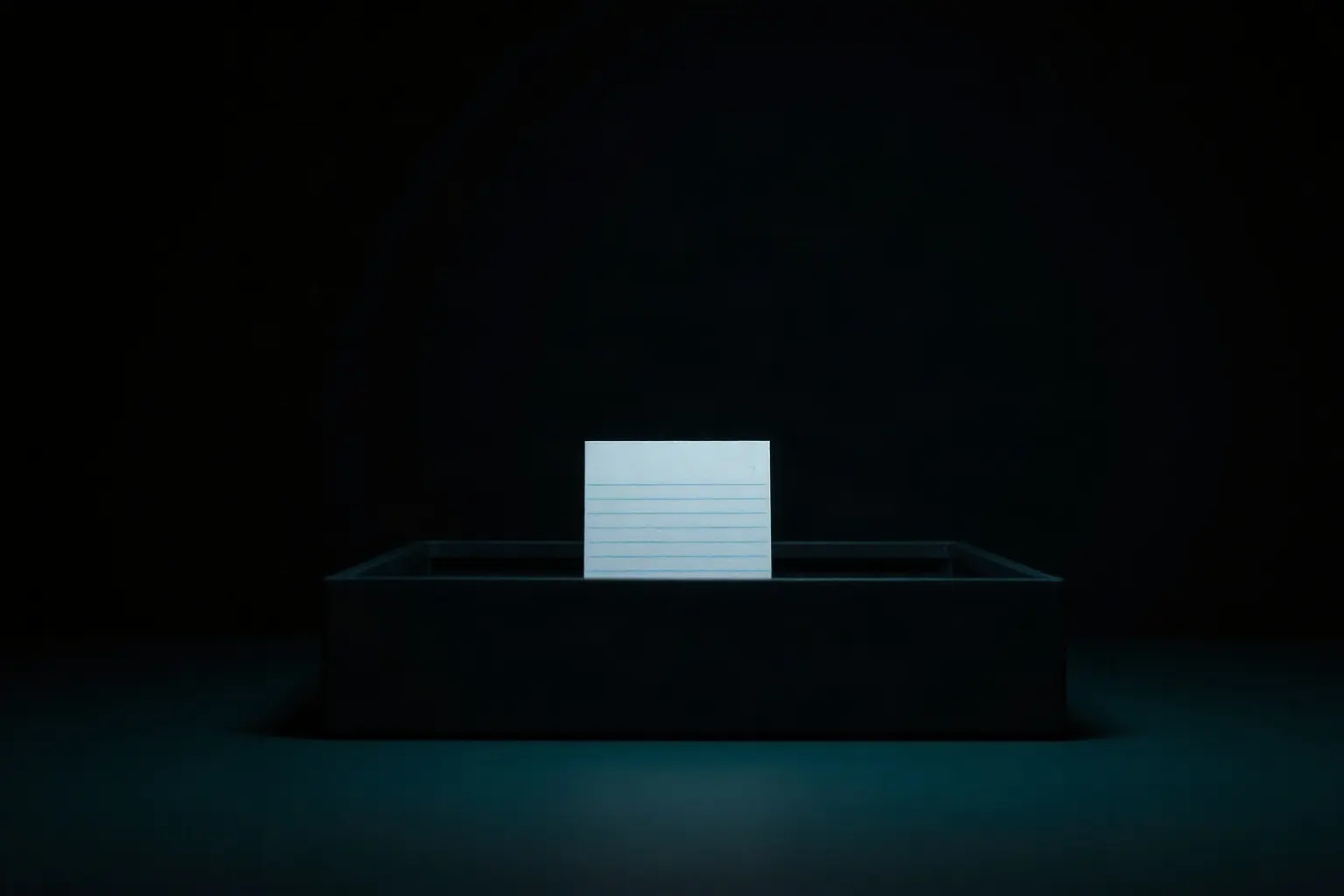 A single index card standing upright in an open card drawer — illustration for llms.txt
